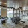 Large fitness center with cardio and weight lifting equipment.