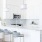 Two Bedroom Apartments in The Gulch Nashville TN - 1200 Broadway - Upscale Kitchen with Quartz Countertops, French Door Refrigerator, Deep Basin Sink with Premium Hardware, Stainless Steel Appliances, and Breakfast Bar with Bar Chairs.