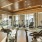 Large fitness center with cardio and weight lifting equipment.